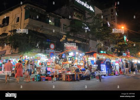 people visit ben thanh night market  ho chi minh city vietnam stock