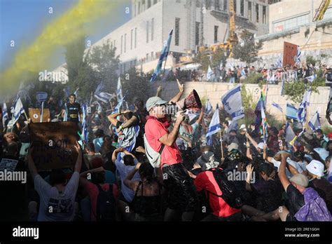 Israeli Police Use A Water Cannon To Disperse Demonstrators Hi Res