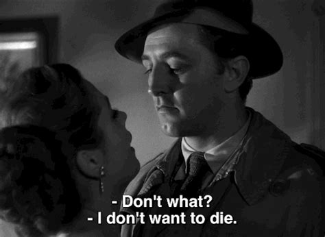 Robert Mitchum Film Noir GIF - Find & Share on GIPHY