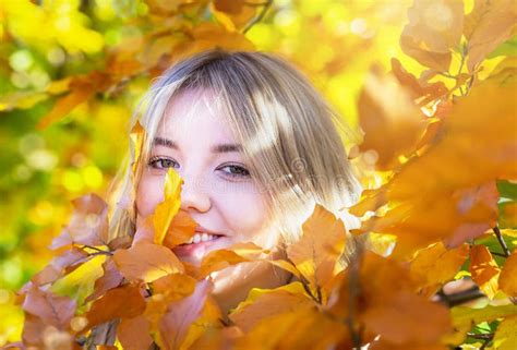 Happy Caucasian Cute Smile Woman On Yellow Autumnal Background Girl