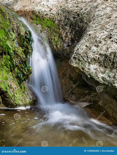 Waterfall Along Little Fern Hiking Trail At River Place, Austin Royalty