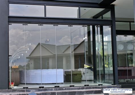 Frameless Stacking Doors - Clear View Frameless
