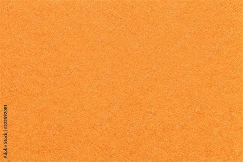 Texture of old bright orange paper background, closeup. Structure of ...