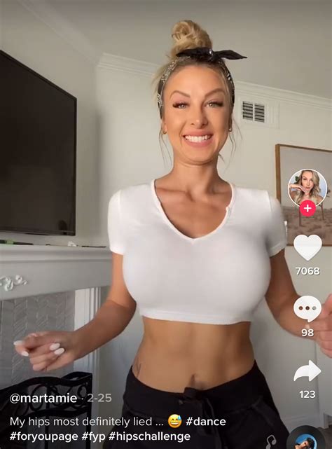 Busty Blonde TikTok Performer Showing Off Her Sexy Curves In A Crop Top