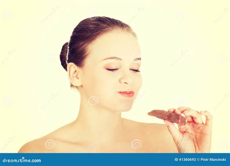 Beautiful Woman Biting A Chocolate Bar Stock Photo Image Of Healthy