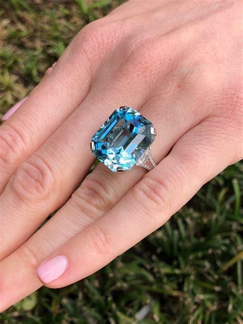 Emerald Cut Aquamarine Engagement Rings