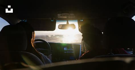 person driving car  night time photo  driving image  unsplash