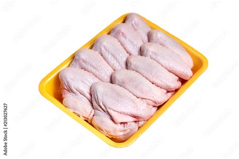 Raw And Uncooked Chicken Wings In A Yellow Plastic Container Meat Of