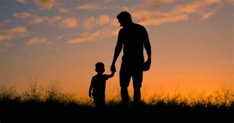 Dad And Son Holding Hands