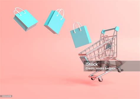 Flying Shopping Cart With Shopping Bags On A Pink Background Stock