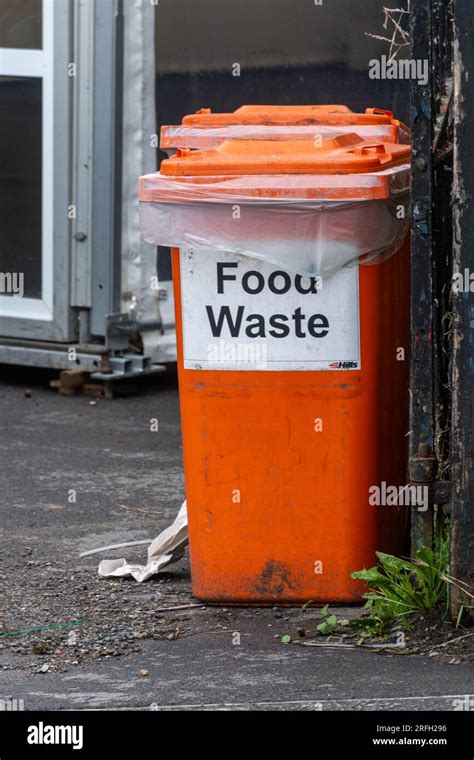 Food Waste Bin Bright Orange Wheelie Bin Stock Photo Alamy