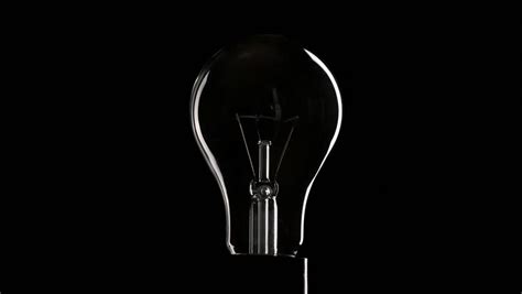 Light Bulb Over Black Background Stock Footage Video Shutterstock