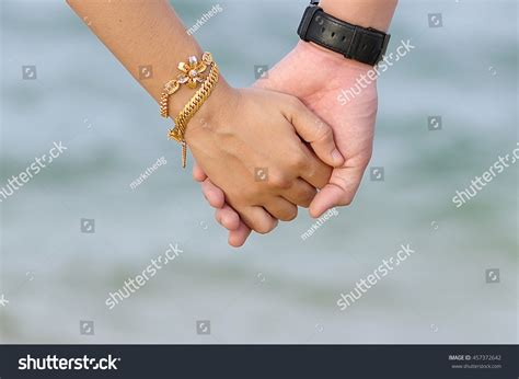 Beautiful Couple Holding Hands