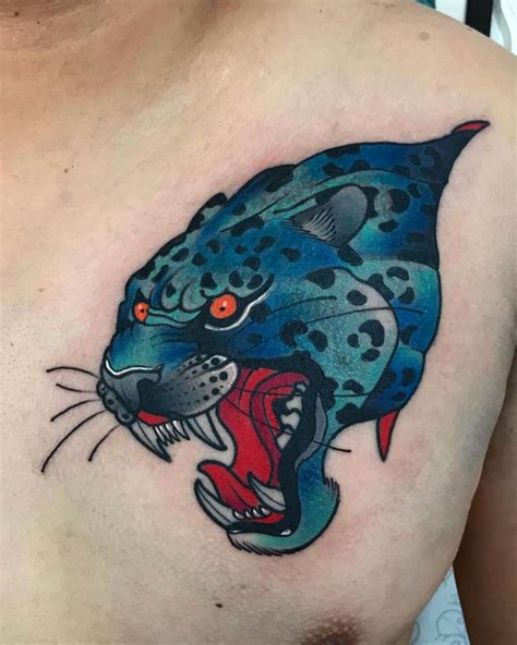 Traditional Leopard Head Tattoo