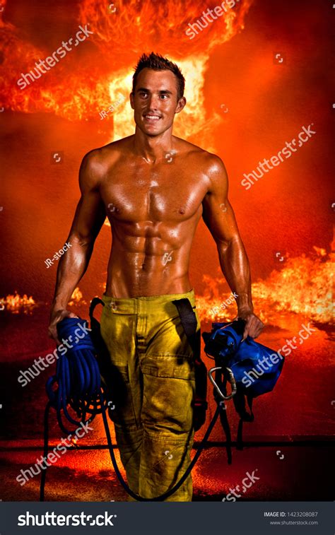 Muscular Fire Fighter Sweating Man Peak Stock Photo 1423208087