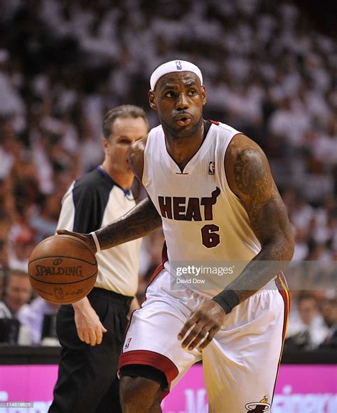 LeBron James of the Miami Heat handles the ball in Game Three of the ...