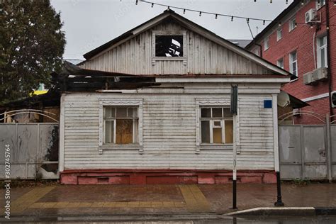 Old burned down house on the street Stock Photo | Adobe Stock