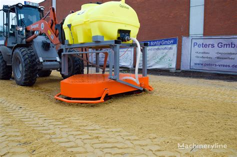 OPTIMAS Pflasterfugen Füllgerät für Radlader paving laying machine for