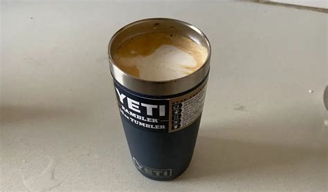 yeti-10-oz-tumbler-cup-filled-with-coffee - The Cooler Box