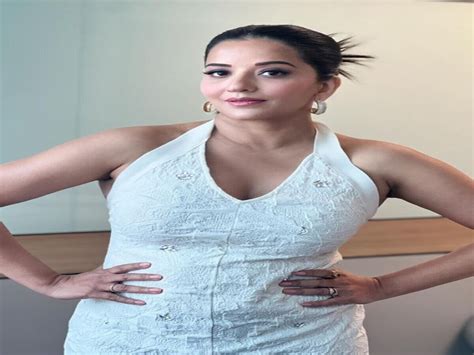 Monalisa Is Seen Giving Very Hot Poses In A White Bodycon Deep Neck