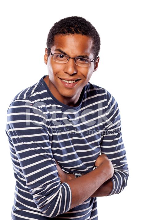 Foto De Stock Sonriente A Joven Morena Con Gafas Y Los Brazos Cruzados