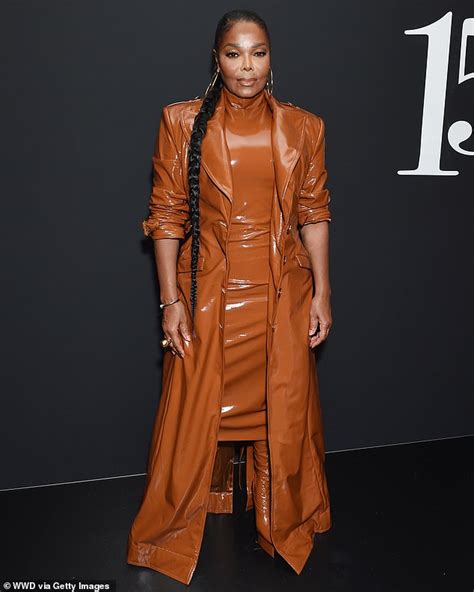 Janet Jackson Rocks Brown Leather Dress And Matching Jacket As She