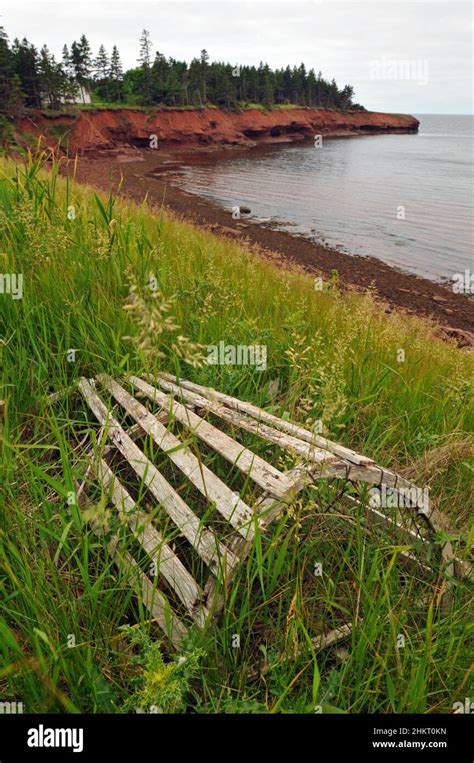 An Old Lobster Trap Sits Above Seaside Cliffs Along The South Shore Of