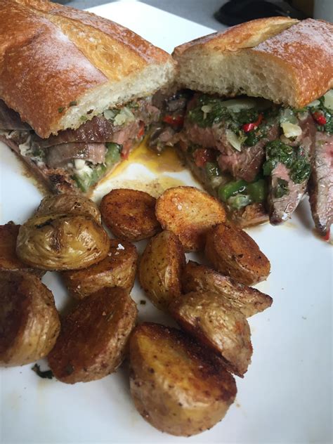 [homemade] Grilled Flank Steak On A Portuguese Roll With Fresh Chimichurri And Roasted Cajun