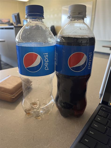 Empty Pepsi bottle next to not-empty Pepsi bottle. : r/notinteresting