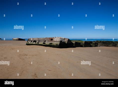 Arromanches Les Bains Gold Beach Remnants Of The Artificial Landing Harbour Mulberry Harbour