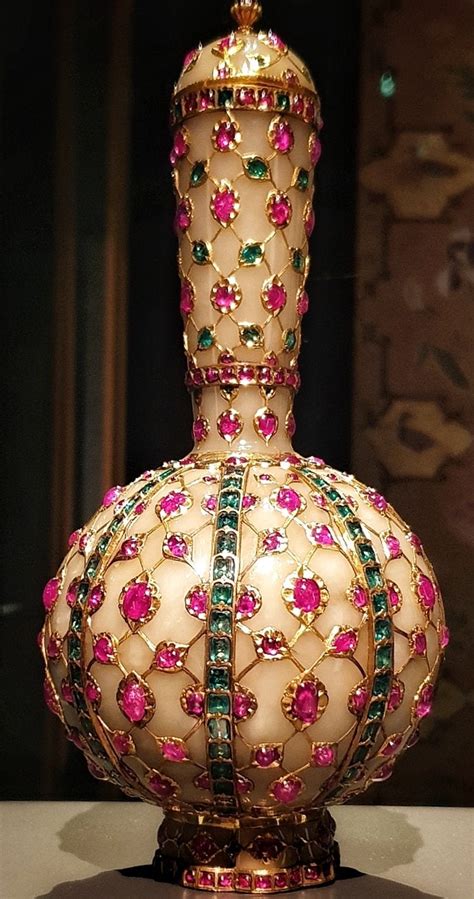 The Clive Flask A 17th Century Mughal Jade And Gold Flask Decorated With Emeralds And Rubies