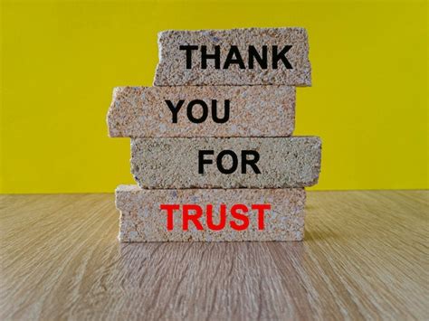 Premium Photo Concept Red Words Thank You For Your Trust On Brick