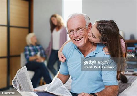 Grandma And Grandpa Kissing Stockfotos En Beelden Getty Images