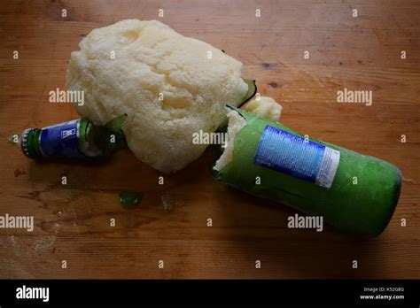 Frozen beer exploded in a green beer bottle Stock Photo - Alamy