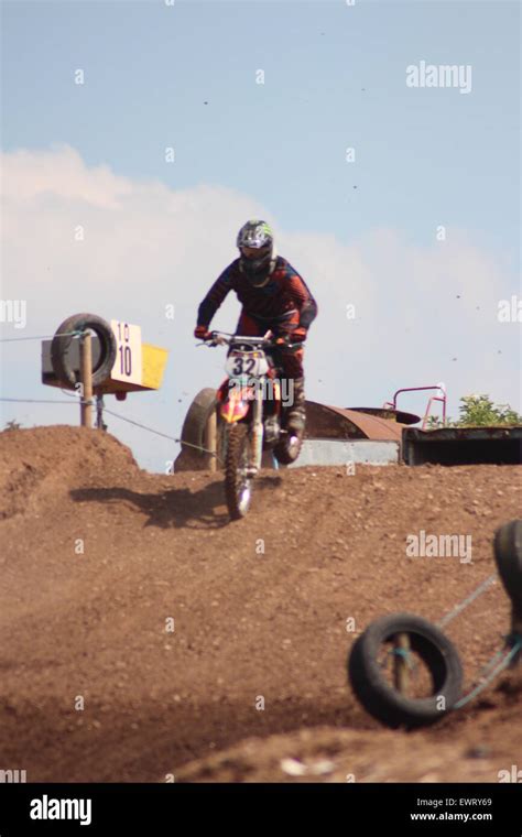 Action motorcycle, motocross, Speed and stunts leaping through the Stock Photo, Royalty Free ...