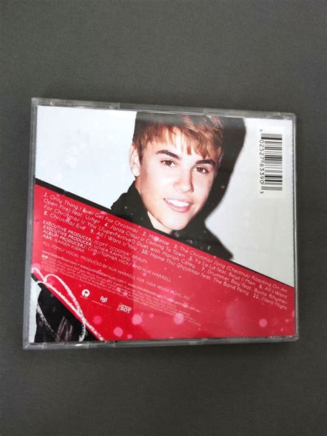 Justin Bieber - Under The Mistletoe Album, Hobbies & Toys, Music ...