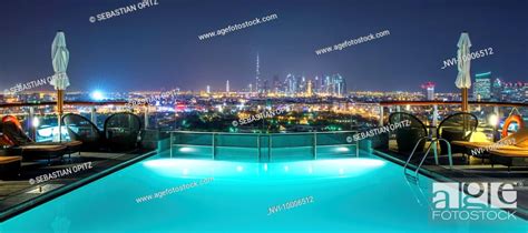 View of Dubai from the pool of Hilton Dubai Creek Hotel, UAE, Stock ...