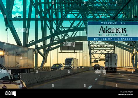 Traffic at sunset on the Hernando de Soto Bridge over the Mississippi ...