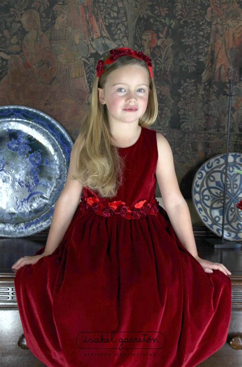 Red Velvet Girls Dress With Rose Sash Detailing In 2021 Girls Red Velvet Dress Girls Dresses