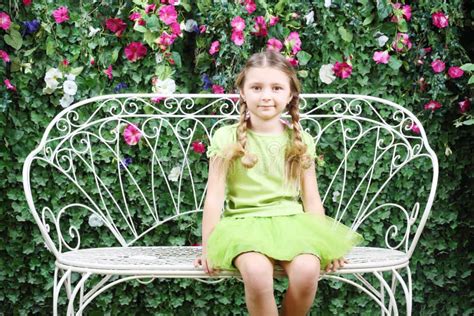 Kid Girl Putting On Shoes On Swing Stock Image Image Of Dressing