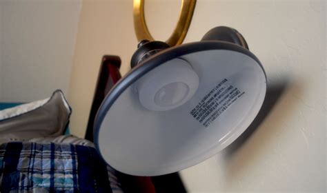 Install A Sconce Light With No Wiring Using A Puck Light Hip2save