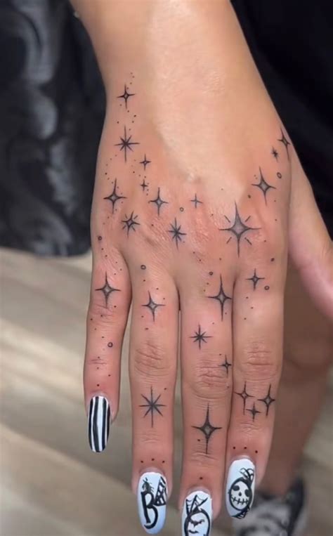 Pin On Tattoo Hand Tattoos For Girls Hand And Finger Tattoos Small