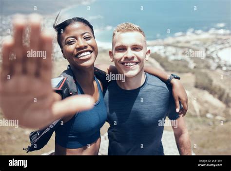 Interracial Couple Selfie Or Hiking On Mountains In Nature Environment