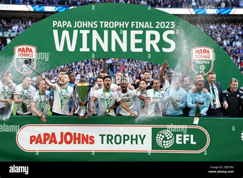 Bolton Wanderers Lift The Trophy After Winning The Papa Johns Trophy