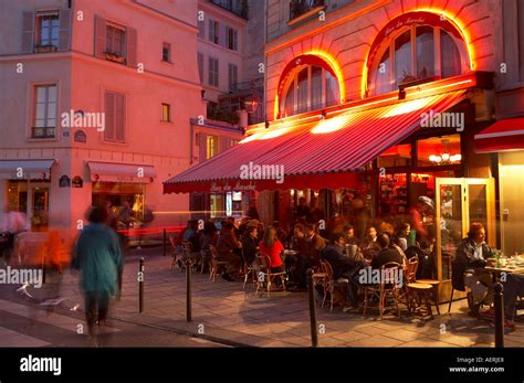 Pavement cafe at night on the corner of Rue de Seine Rue de Buci St Stock Photo: 4486887 - Alamy