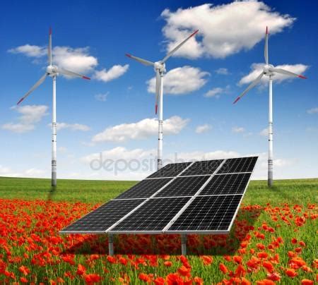 Solar Energy Panels With Wind Turbines And Tree Stock Photo Vencav