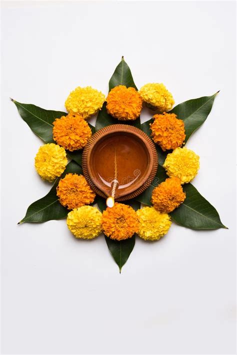 Flower Rangoli For Diwali Or Pongal Or Onam Made Using Marigold Or