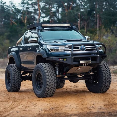 toyota hilux uplifted suspension   toyota hilux toyota lifted