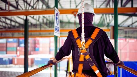 Construction Worker with his Safety Harness | Steel Sheds in Australia