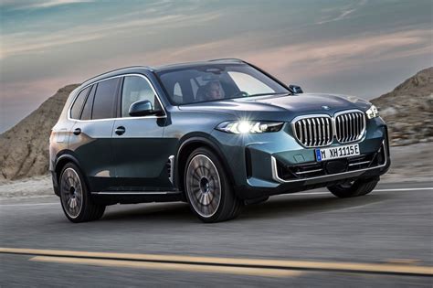 row suvs    road track